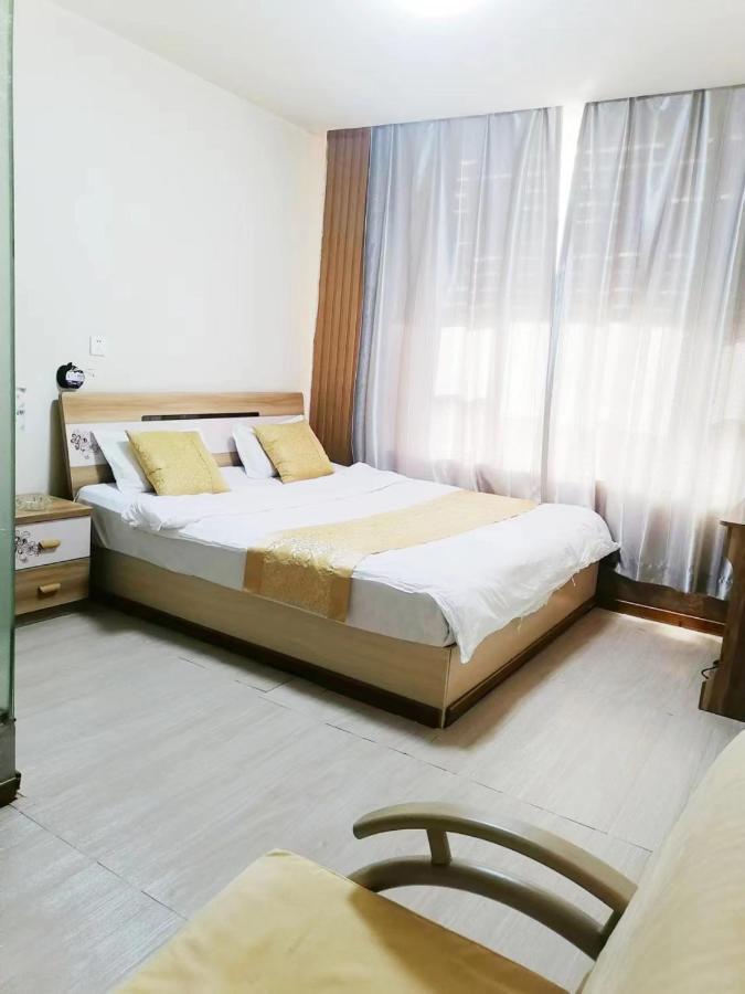 יאנג'י Xinming Fashion Hotel מראה חיצוני תמונה