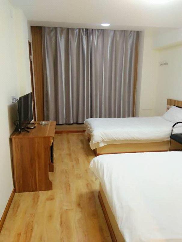 יאנג'י Xinming Fashion Hotel מראה חיצוני תמונה